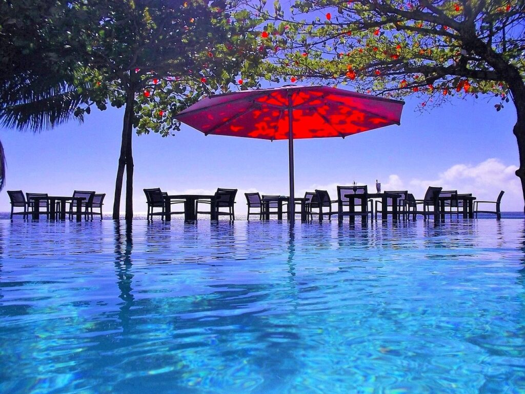 Baha-Shelf-image-with-chairs-and-umbrella